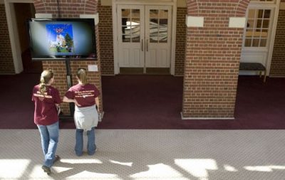 Students watch Remembrance video inside Squires Student Center