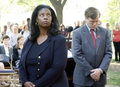 Secretary of Administration Lisa Hicks-Thomas (left) and Governor Bob McDonnell pause as the Capitol Bell Tower rings in memory of the victims of the Virginia Tech tragedy.