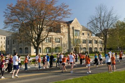 Runners along Washington Street
